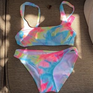 Never worn with tags tie die bathing suit.